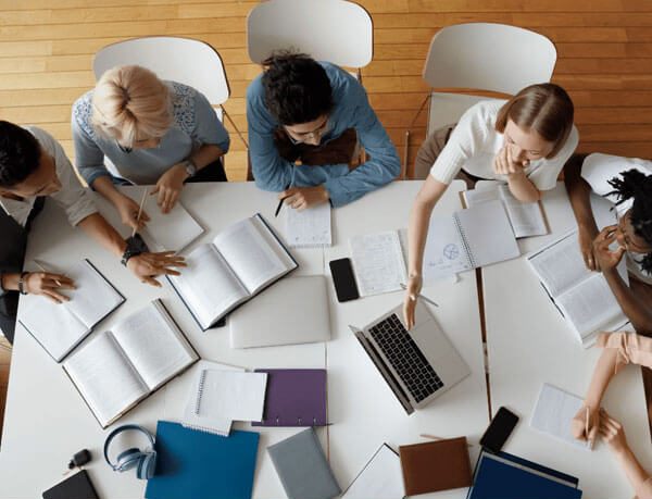 A group taking part in an active peer-learning session